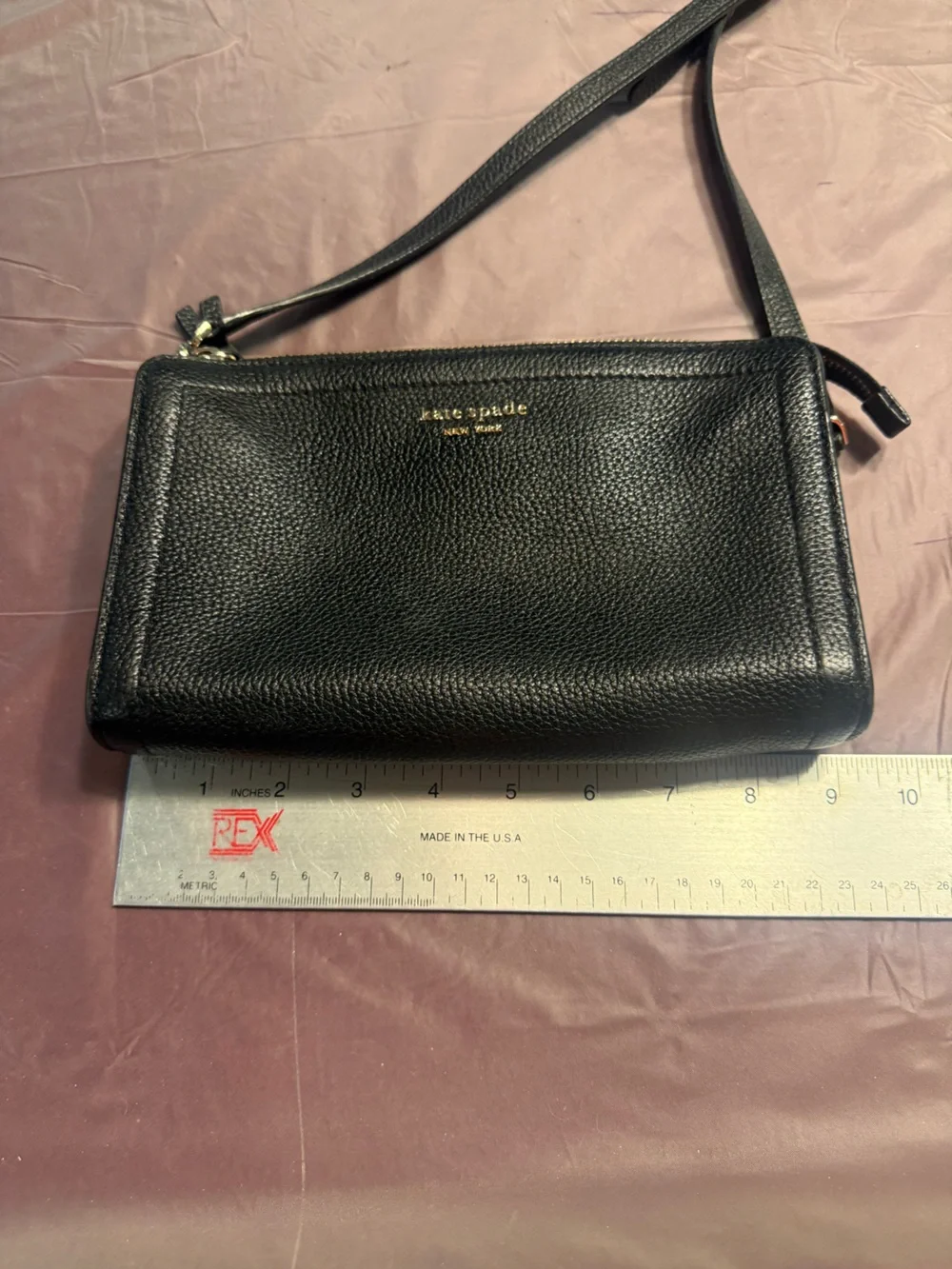 Kate Spade Knott small crossbody clutch in black pebbled leather